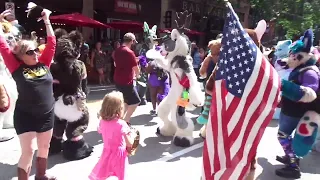 Anthrocon 2022 21 Block Party with the City! - fursuiters dancing in the street