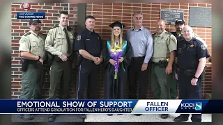 Fallen Iowa officer's daughter graduates, supported by local law enforcement