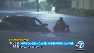 Hurricane Ian: Reporter rescues nurse stranded in chest-high waters