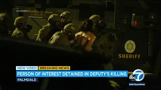 Video shows person of interest detained in deputy's killing in Palmdale