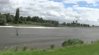 Chinook Helicopter Chasing A Boat