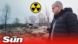 Ukraine officials survey Russian dug trenches in Chernobyl exclusion zone's radioactivity levels