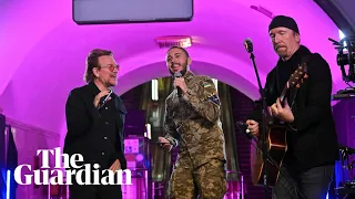 U2's Bono and the Edge give surprise concert in Kyiv metro