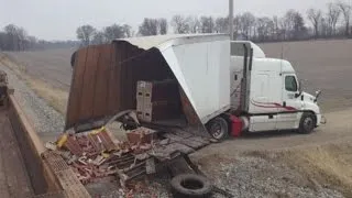 No injuries reported after train slams into semi-trailer