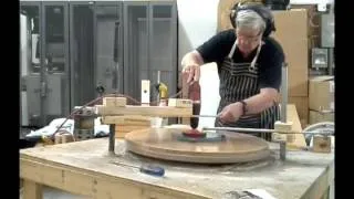 Grinding a mirror with a hand drill