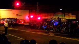 Amtrak And CSX Trains Interrupt Christmas Parade Three Times