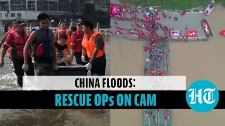 China Floods: Mass evacuations from towns, rafts on roads: aftermath of deadly floods