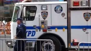 NYPD EMERGENCY SERVICES SQUAD TRUCK 1 RESPONDING ON W. 43RD STREET IN TIMES SQUARE, MANHATTAN, NYC.