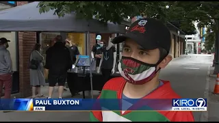 Seattle Kraken merch release and appearance on local news