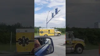Car blocks ambulance in Kearney Missouri l, fire truck and ambulance responding!