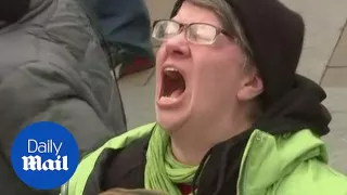 Moment emotional woman yells as Trump is declared President of the US - Daily Mail