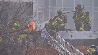 Flames shoot from roof of restaurant in Market Square in downtown Pittsburgh