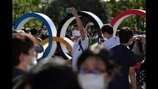 Crowds gather outside Tokyo stadium for Olympics opening ceremony