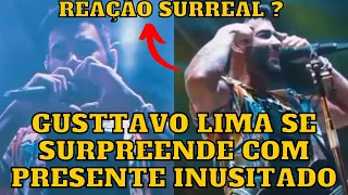 Gusttavo Lima se SURPREENDE com PRESENTE de FÃ em show e tem ATITUDE surreal