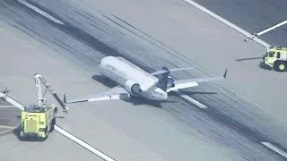 Commuter jet skids down LAX runway after landing gear failure