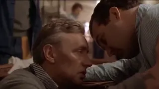 In the Name of the Father: Gerry (Daniel Day Lewis) and IRA Member Confront Ronnie Smalls in Prison