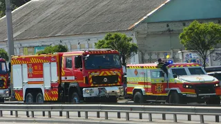 *Lots of Horns* National Guard, Rescue and Fire trucks in convoy with lights