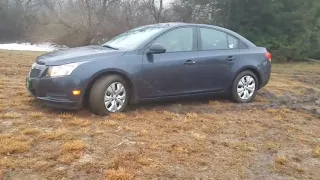 Chevy Cruze stuck in mud