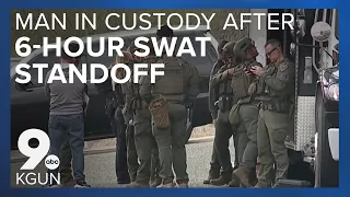 One man in custody after 6-hour standoff with SWAT