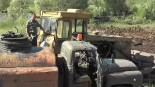 Заправка бульдозера горючим 05. 08. 2016. Пос.Потеряевка.