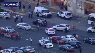 Gunfire erupts in shopping center parking lot; 1 dead, 1 injured