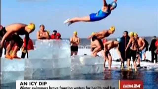 Winter swimmers brave freezing waters for health and fun