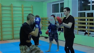 Hand to hand combat. Practicing strokes and techniques on feet