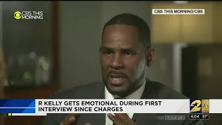 R. Kelly gets emotional during first interview since charges