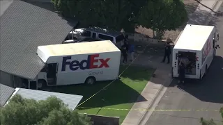 FedEx truck crashes into Arizona home, injuring three people