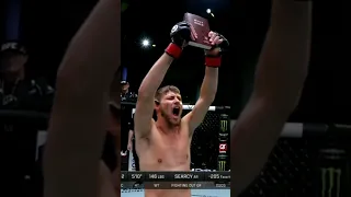 Bryce Mitchell holds up the Bible and yells "Freedom" as he was being announced before fight