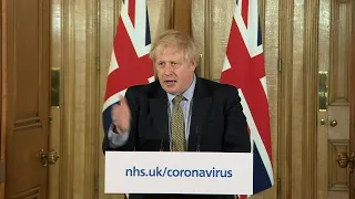 Boris Johnson says UK to close schools as coronavirus deaths rise | AFP