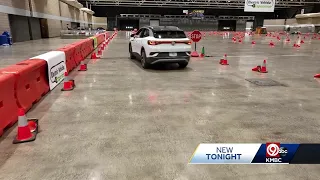 An EV driving track inside Bartle Hall highlights the Kansas City Auto Show's return