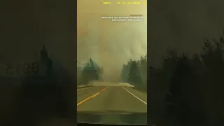 Dashcam video shows family escaping wildfire in Canada