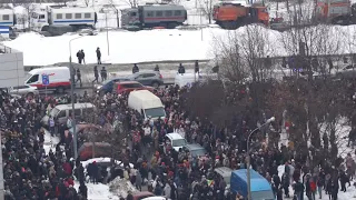 Police block crowd outside cemetery where Navalny is buried | AFP