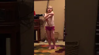 Ava Practices Baton Tricks