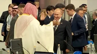 Putin high-fives Saudi Crown Prince at G20