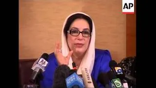 AP pix as Benazir Bhutto gives presser ahead of return to Pakistan