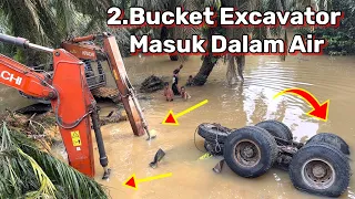 Truck enters river in songket 2.bucket Excavator