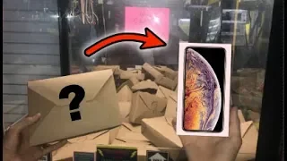 WON iPhone XS MAX from MYSTERY BOX CLAW MACHINE!!! | JOYSTICK