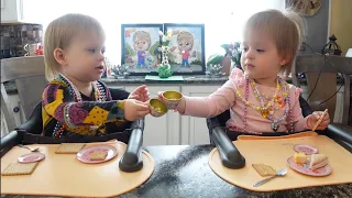 Twins have a tea party