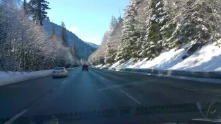 Time lapse driving over Snoqualmie Pass in the snow