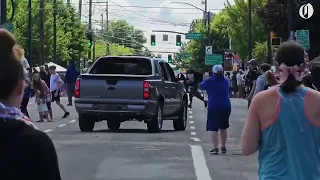 Pickup truck plows through Rose Festival's Grand Floral Parade route