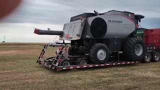 Johnson Farms and Wilson Harvesting. Four of their new S98 Gleaner Combines and support equipment!