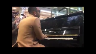 John Legend Performs at London Train Station