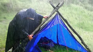 Solo Camping  in a heavy storm.  Building shelter to survive. Bushcraft. Camping in the rain