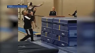 Split-second catch by Massachusetts gymnastics coach caught on video