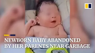 Newborn baby girl abandoned next to garbage bin in China because her parents wanted a boy