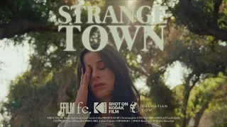 Buzzy Lee - Strange Town (Official Music Video)