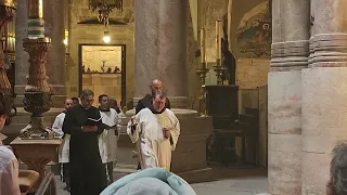 A Roman Catholic ceremony in front of the tomb of Jesus. Church of the Holy Sepulchre, Jerusalem