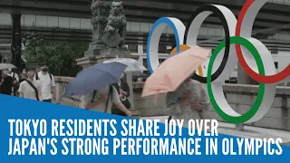 Tokyo residents share joy over Japan's strong performance in Olympics